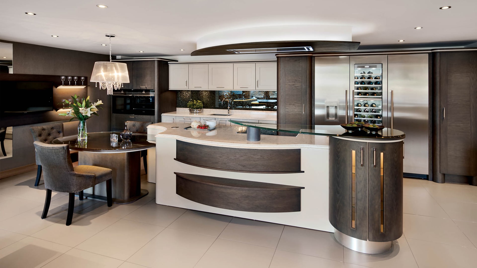 neutral-toned Callerton Kitchens by J.S. Geddes featuring light beige units and dark wooden finishes