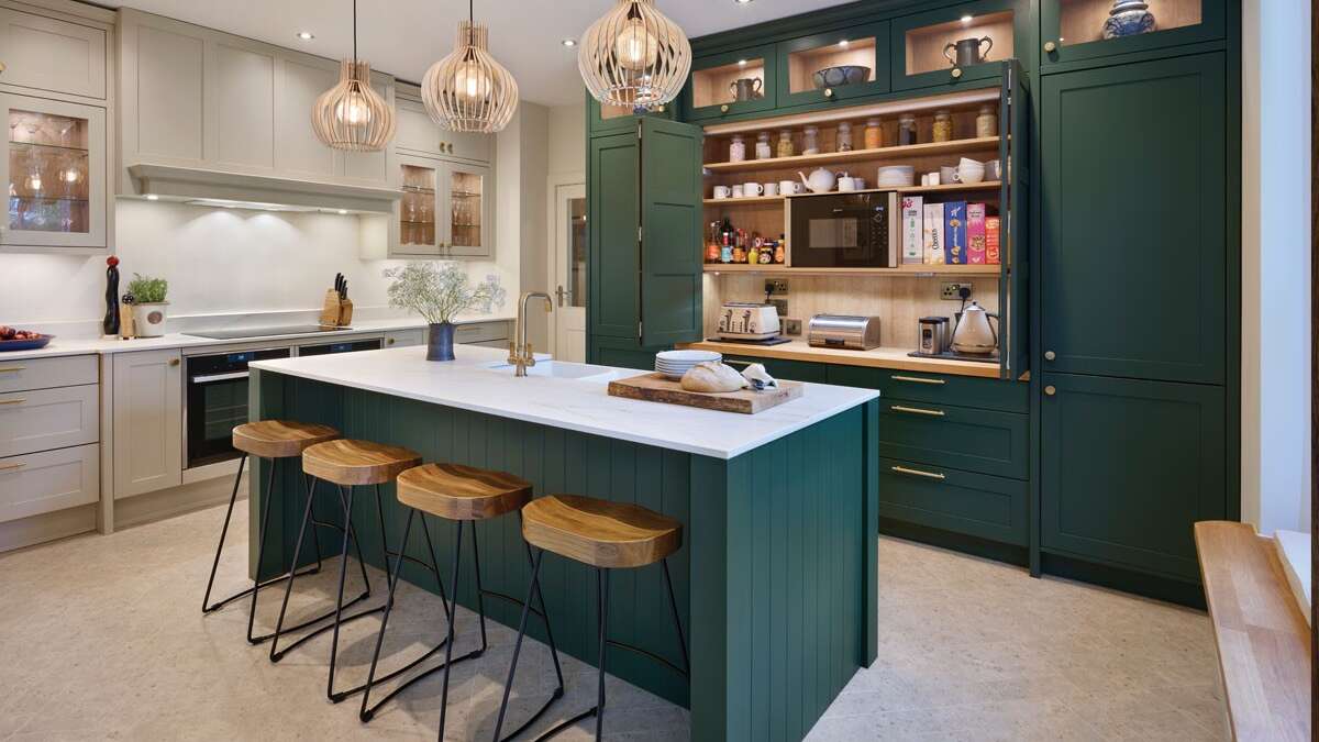 Green Callerton floor to ceiling cabinet doors from Kitchens by JS Geddes